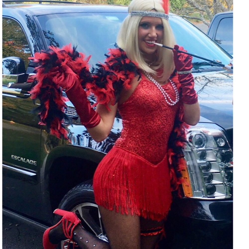 One piece. Sequin and fringe body suit.